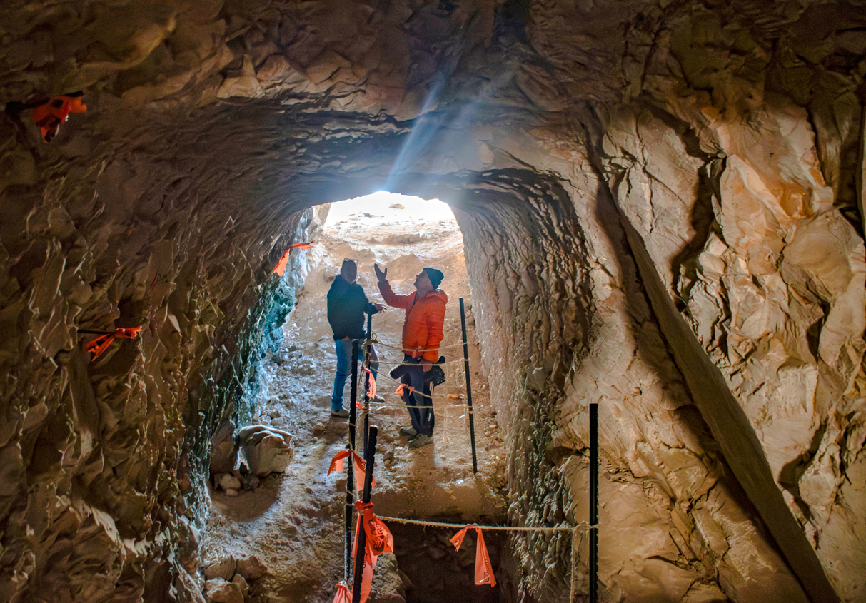 Archeologists mulling over their recent discovery near Kibbutz Ramat Rachel in Jerusalem.